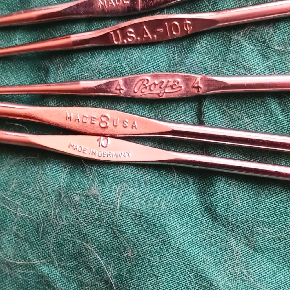 Vintage crochet or tatting hooks.